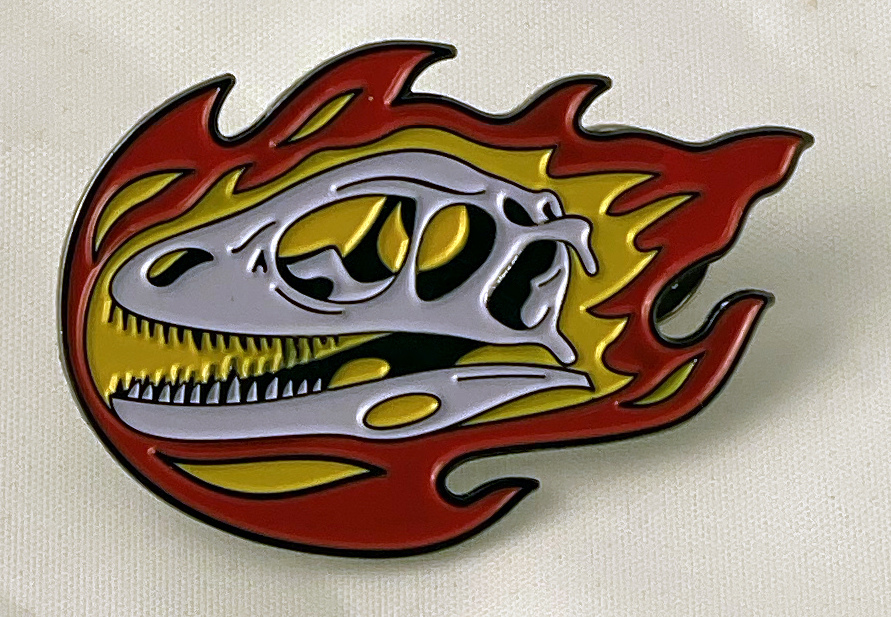 Flaming Dinosaur Skull Pin